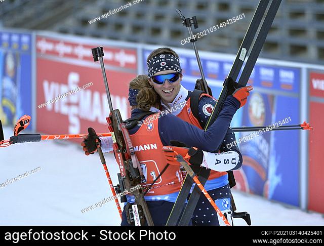 Susan Dunklee, left, and Sean Doherty from USA celebrate after placing third during the single mixed relay at the Biathlon World Cup in Nove Mesto na Morave