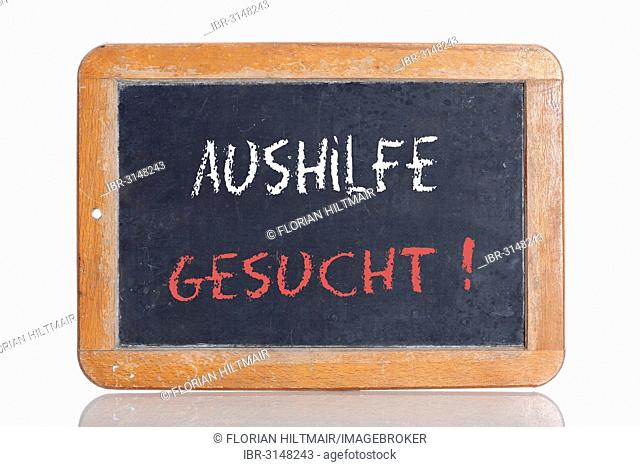 Old chalkboard with the words AUSHILFE GESUCHT, German for Help wanted