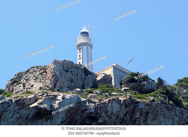 lighthouse Cabo Nao Cape on rocks mountain Alicante Spain