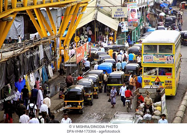 Crowd and traffic in Behram Naupada ; Anant Kanekar Marg ; Bandra ; Bombay Mumbai ; Maharashtra ; India 9-September-2009
