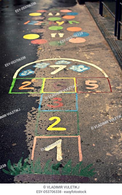 Children's hopscotch game with squares and numbers in different colors on the street