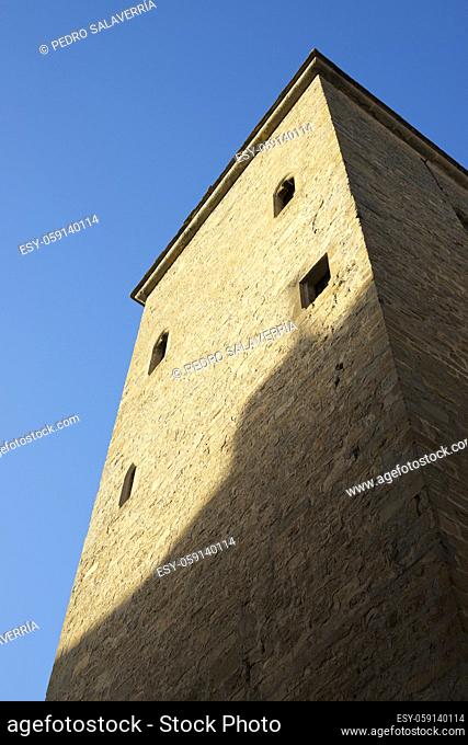 Medieval tower, known as the prison tower or clock tower, in the city of Jaca, Pyrenees, Huesca province, Aragon in Spain