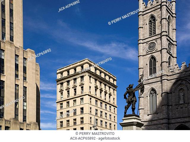 De Maisonneuve Monument facing one of the Spires of the Notre-Dame Basilica, Place d'Armes, Old Montreal, Quebec, Canada