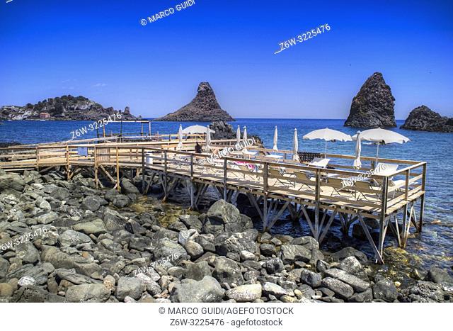 The beaches on stilts of Aci Trezza in Sicily Italy