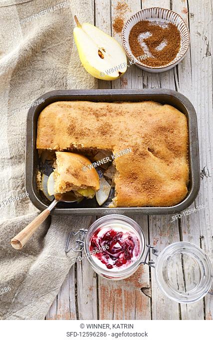 Pear and cinnamon bake with cranberry and yoghurt