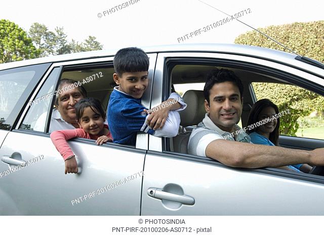 Family traveling in a car