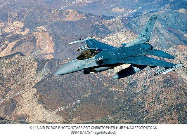 An F-16 Fighting Falcon, from the Alabama Air National Guard, participates in a training sortie during the Green Flag-West 13-2 exercise Nov  4, 2012