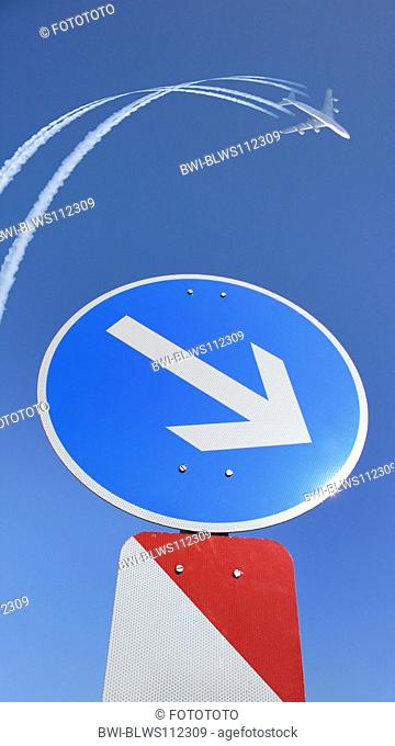 airplane obeying traffic sign, changing its direction