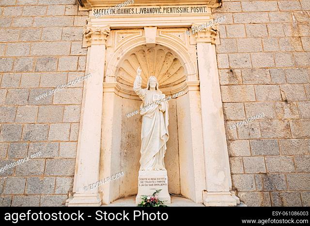 Ancient statue on the territory of the Church of the Nativity of Our Lady in Prcanj, Montenegro