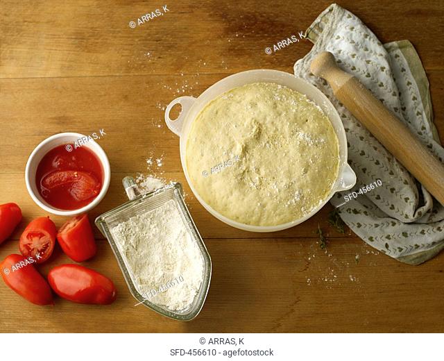 Pizza dough and ingredients