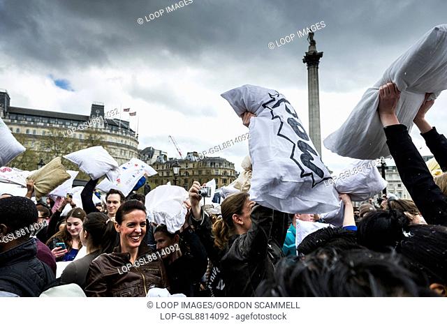 People gather in Trafalgar Square to participate in the International Pillow Fight Day