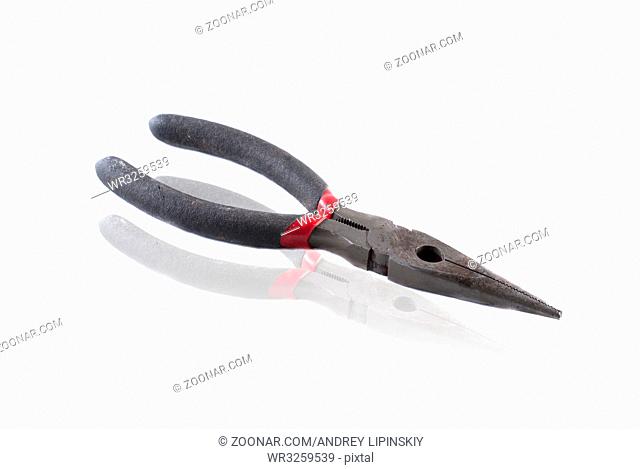 pliers isolated on white background with mirror reflection