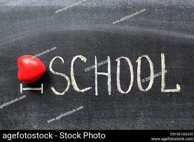 I love school phrase handwritten by color chalks on the blackboard