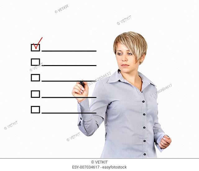 young woman drawing check boxes