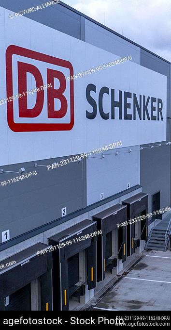 PRODUCTION - 21 November 2023, Mecklenburg-Western Pomerania, Rostock: The building for the new high-bay warehouse of logistics company DB Schenker