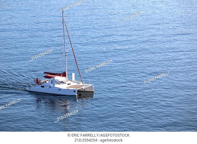 Catamaran yacht sailing out from Ajaccio Corsica