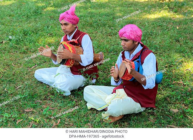 Tribal musicians playing folk music, jagdalpur, bastar, chhattisgarh, india, asia