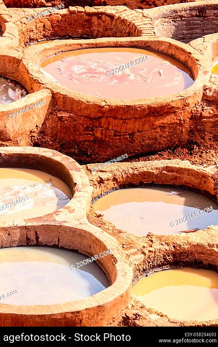 Tradtional old way of dyeing leather, tanneries, Fes, Morocco