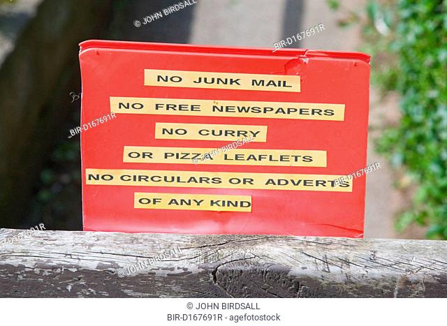 Sign outside house requesting the no junk mail is delivered, each year 78, 000 tonnes of junk mail is generated and for each tonne of junk mail produced 17...