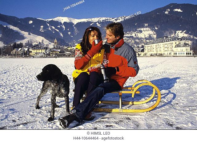 10644464, alpine, Alps, mountains, village, holidays, drink, drinks, dog, coffee, Austria, Europe, pair, couple, sledge, sledg