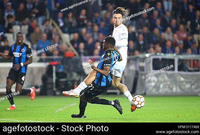 Manchester City's Jack Grealish and Club's Clinton Mata fight for the ball during a game between Belgian soccer team Club Brugge and English club Manchester...