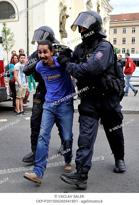 Policemen intervene during the protest against refugee quotas by far-right Workers' Youth and meeting in support of refugees and against xenophobia at the...