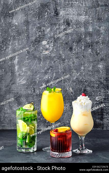 Set of cocktails - mojito, pina colada, rum and orange, old fashioned