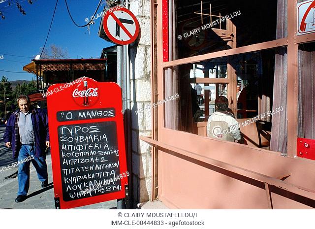 The menu outside of the Manthos taverna. Konitsa, Epiros, Greece, Europe