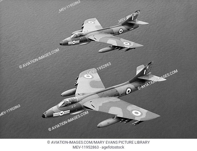 Two RAF 20 Squadron Hawker Hunters in Formation with External Fuel-Tanks and Rockets