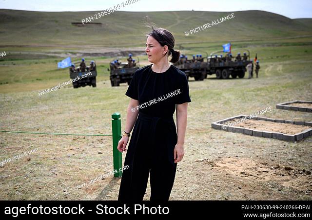 30 June 2023, Mongolia, Ulan Bator: Annalena Baerbock (Bündnis 90/Die Grünen), Foreign Minister, visits a Bundeswehr training station where Mongolian soldiers...