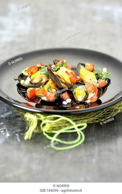 Mussels with tomatoes an basil