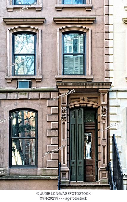 Manhattan, New York City, Partial View of a Brownstone Townhouse, Front entry Shutters partially open