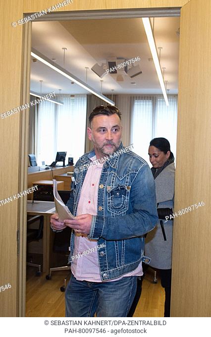 Founder of (Pegida) Patriotic Europeans Against the Islamisation of the West, Lutz Bachmann, leaves the courtroom in front of his wife Vicky Bachmann after the...