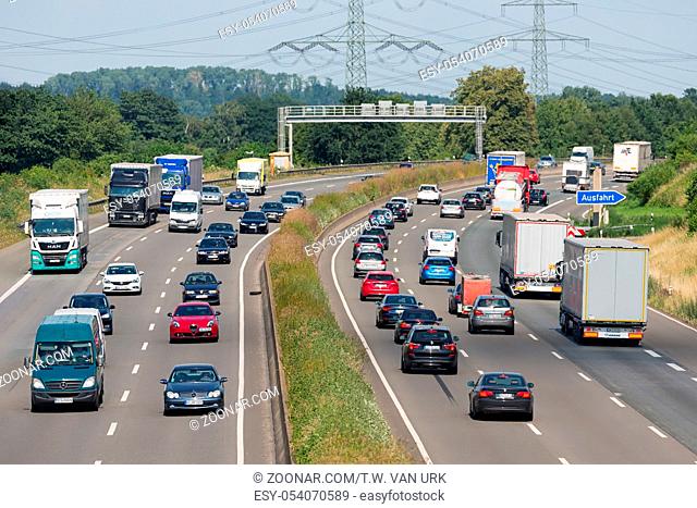 Eschweiler, Germany - June 28 2018: Highway with cars and trucs along german city Eschweiler and near Koln