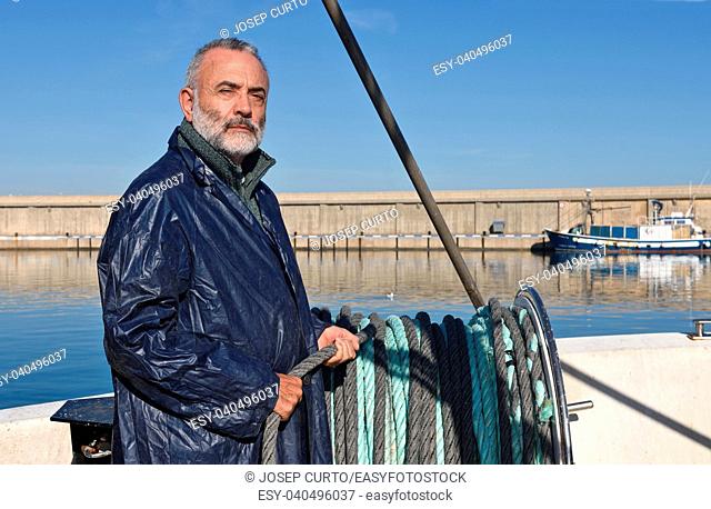 fisherman in the fishing port of Escala, Costa Brava, Girona province, Spain