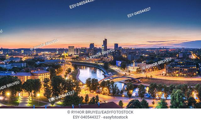 Vilnius, Lithuania, Eastern Europe. Modern Office Buildings Skyscrapers In Business District New City Center Shnipishkes In Night Illuminations