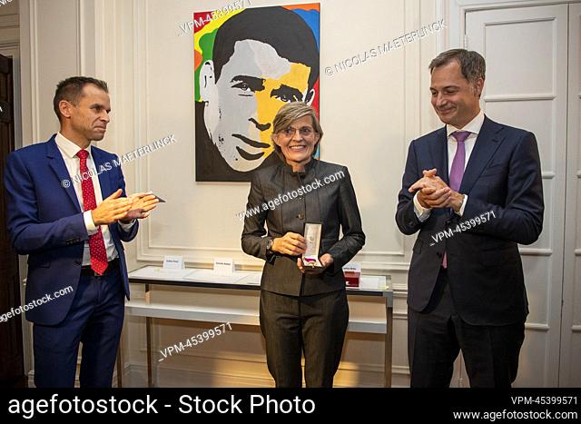 Consul General Filip Vanden Bulcke, Annette Bakker and Prime Minister Alexander De Croo pictured during an honorary medals ceremony in the margin of the 77th...