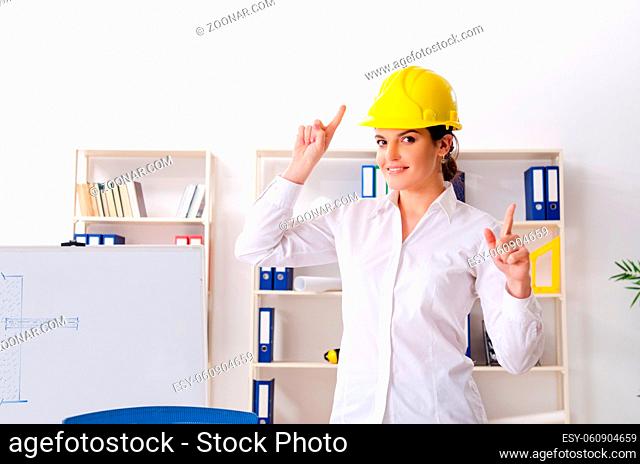 Female architect working in the office