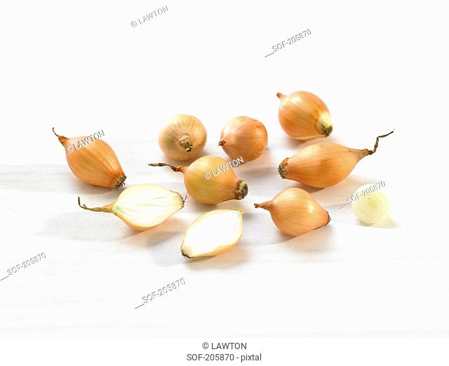 Echalots on a white background