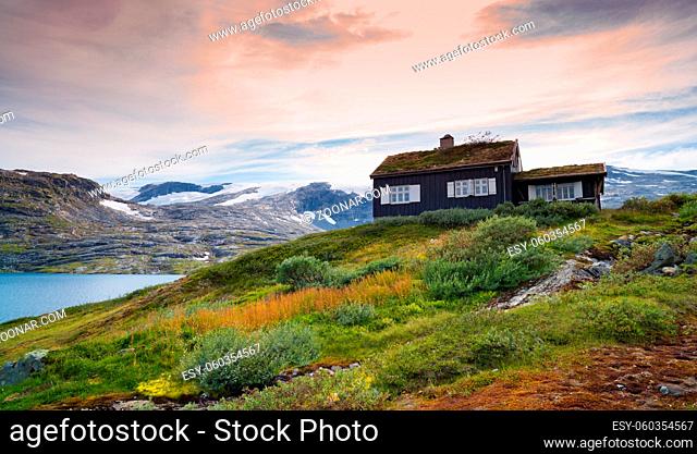 typical norwegian house in a beautiful natural surrounding