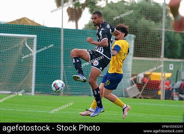 Angers' Cedric Hountondji and Union's Cameron Puertas Castro pictured during a football match between Union Saint Gilloise et Angers SCO at the winter training...