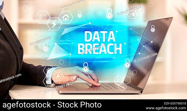 DATA BREACH inscription on laptop, internet security and data protection concept, blockchain and cybersecurity