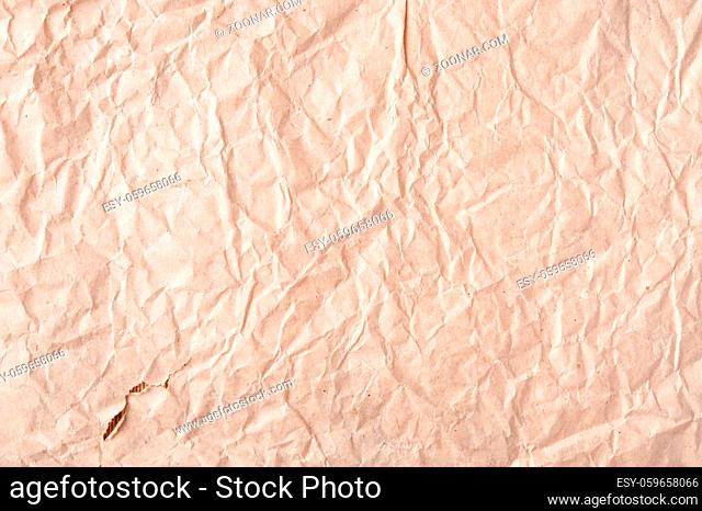 Crumpled old paper texture. Abstract grunge background. Distressed and industrial backdrop design. Dirty detail grain pattern