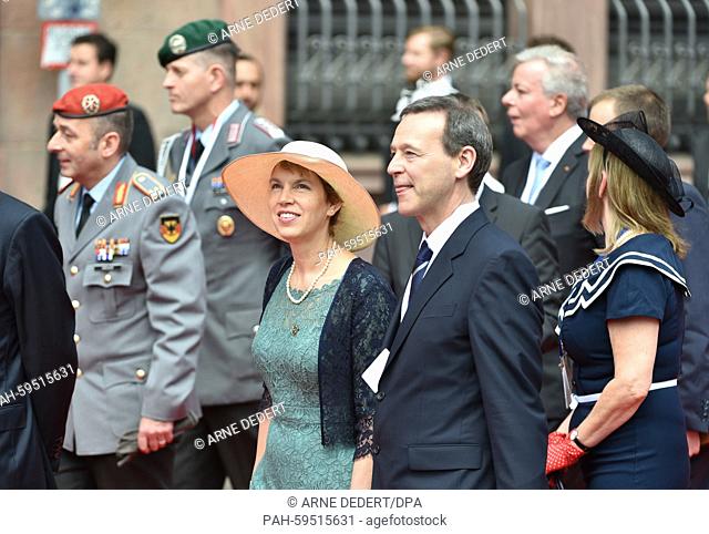 Simon McDonald, Britain's ambassador to Germany, and Lady Olivia McDonald walk to the St. Paul's Church during the visit of Britain's Queen Elizabeth II to...