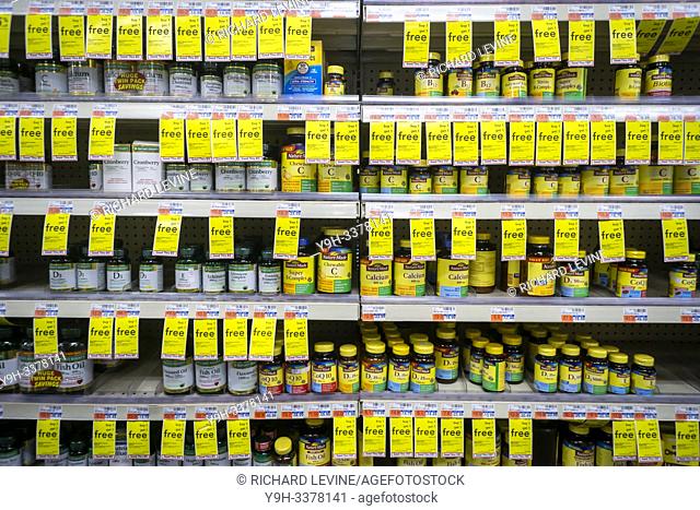 A selection of vitamins on the shelves of a drugstore in New York during a BOGO sale on Monday, July 22, 2019. (© Richard B. Levine)
