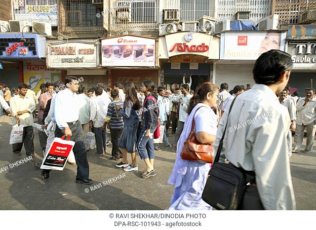 People rushing to work on road near Borivali Railway station Bombay  Mumbai;  Maharashtra; India