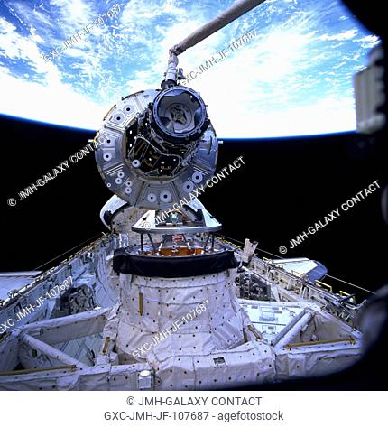 One of the STS-88 astronauts aimed a 70mm camera through Endeavour's aft flight deck windows to record this Dec. 5 image of the Unity connecting module as it...