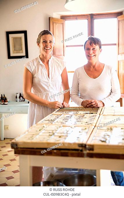 Portrait of two women in handmade soap workshop