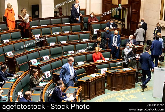 N-VA parliament members leave as a protest during a plenary session of the chamber at the federal parliament in Brussels