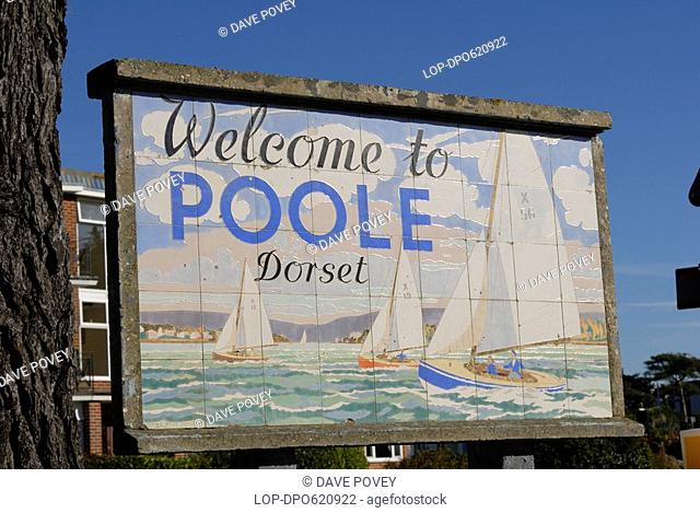 England, Dorset, Sandbanks, Poole, A tiled sign welcoming visitors to Poole in Dorset where Weymouth and Portland's National Sailing Academy will host the...